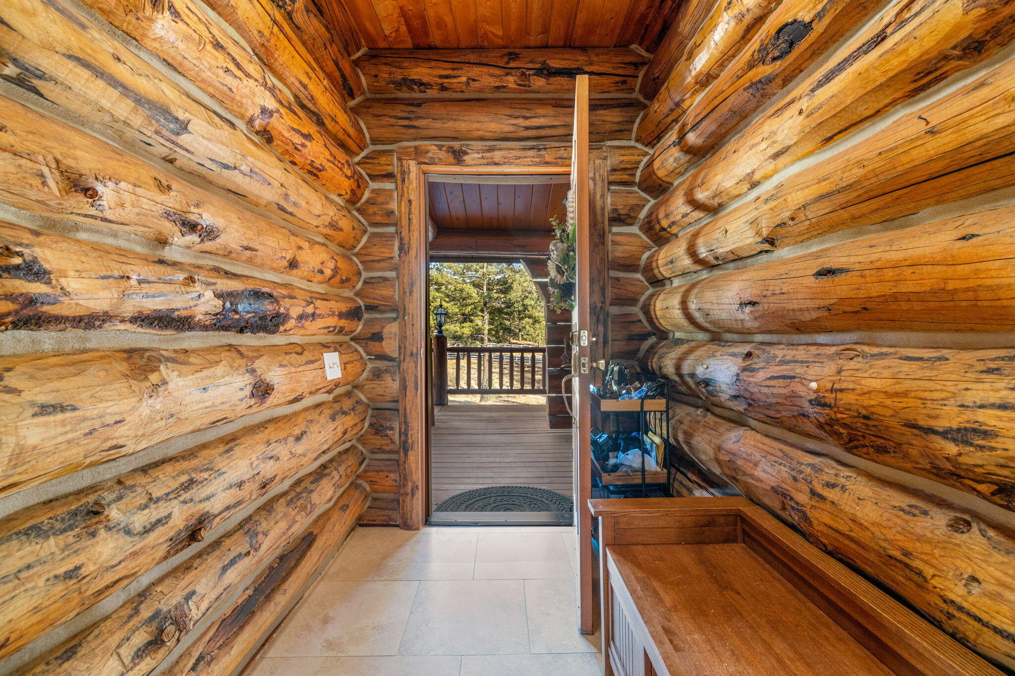 60766 Table Mountain Road Mountain Center, CA 92561 - Photo 6 of 46 a view of an outdoor space with wooden floor and a window