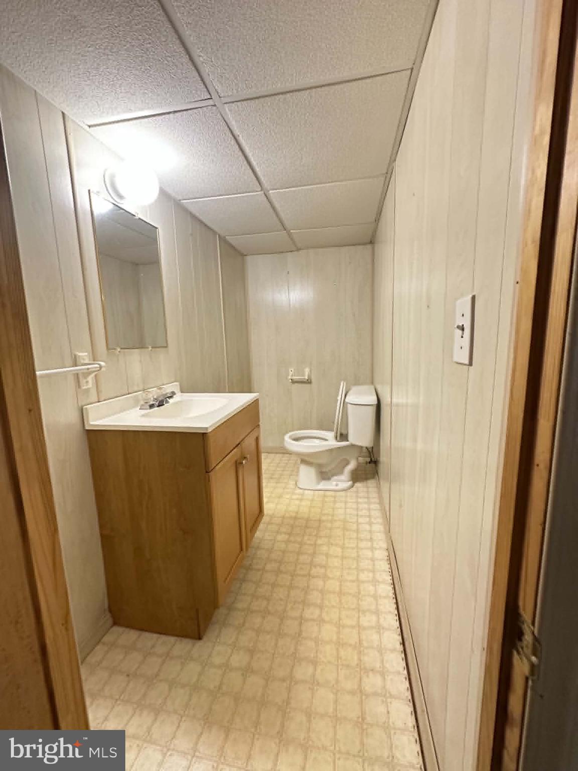 805 Baltimore Road Shippensburg, PA 17257 - Photo 15 of 23 a bathroom with a sink a toilet and a mirror