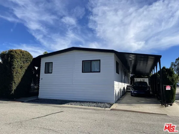 a house view with a outdoor space