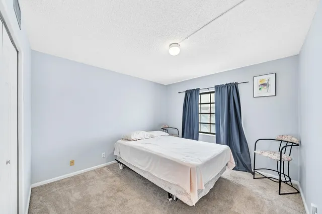 a view of kitchen with furniture and cabinets