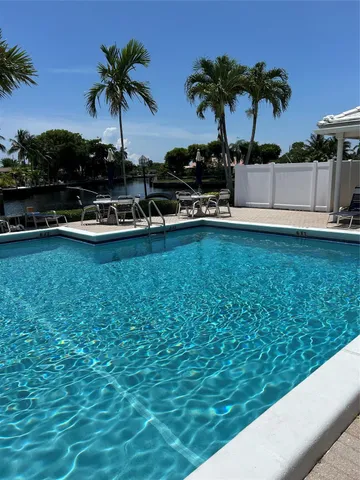 a kitchen with stainless steel appliances a stove and a refrigerator