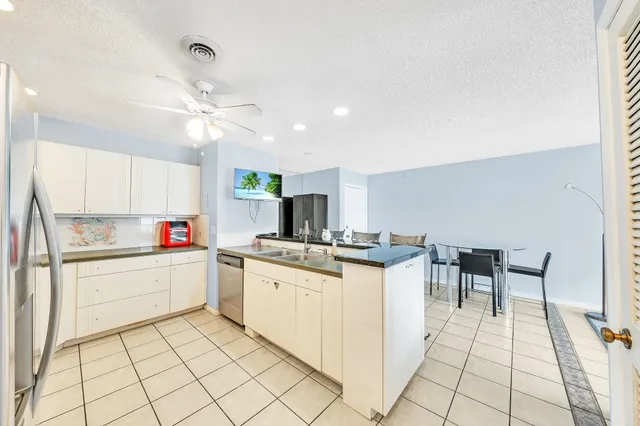 a view of livingroom with furniture and workspace