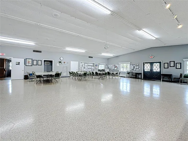a view of a living room and dining room
