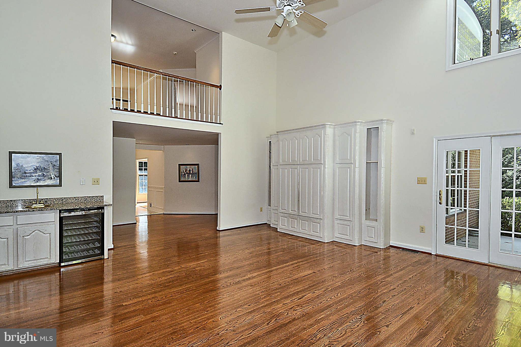720 Clear Spring Road Great Falls, VA 22066 - Photo 8 of 30 Built-in entertainment center & balcony overlook