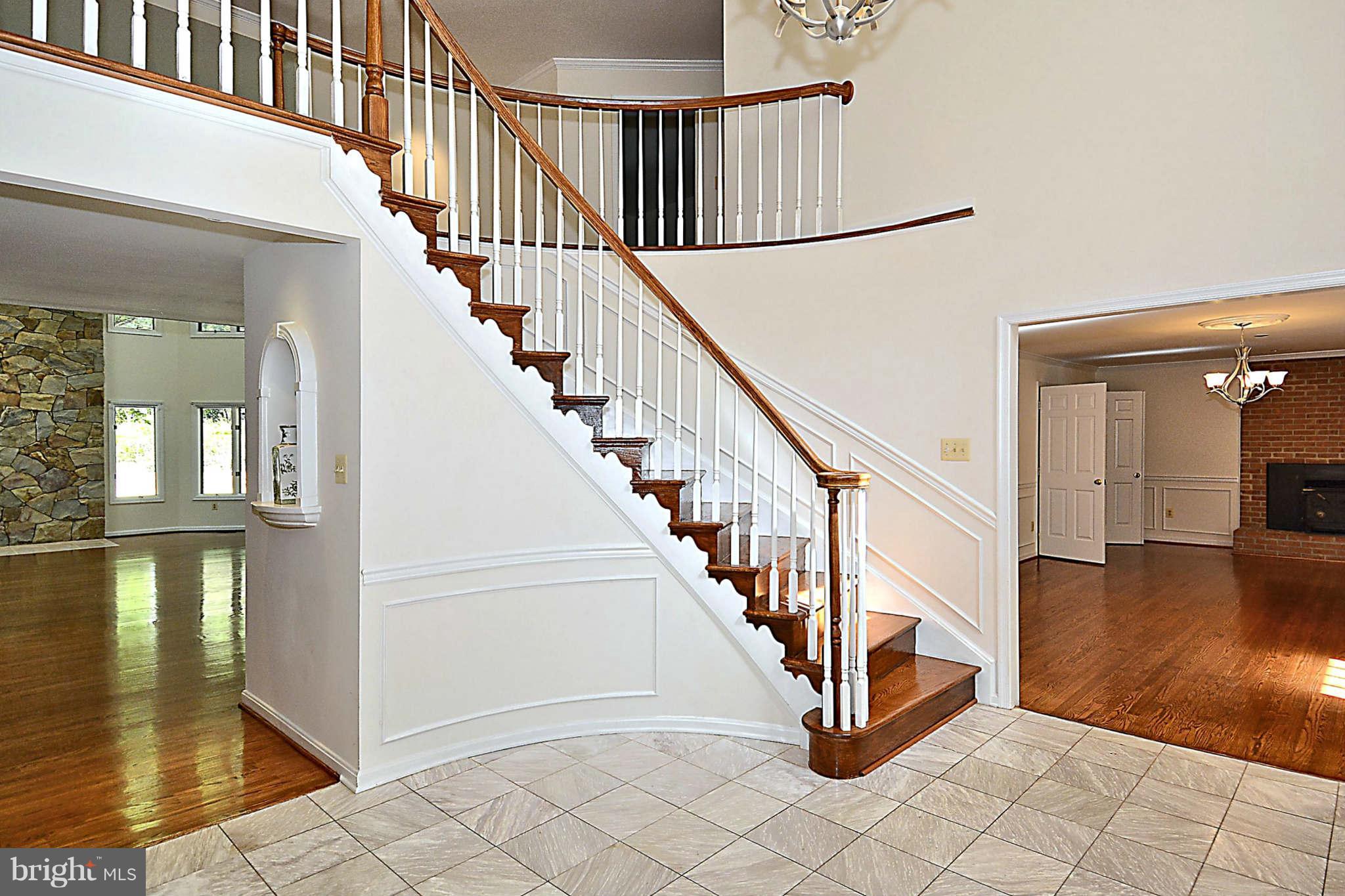 720 Clear Spring Road Great Falls, VA 22066 - Photo 10 of 30 Grand foyer w/ marble floor & 2 coat closets