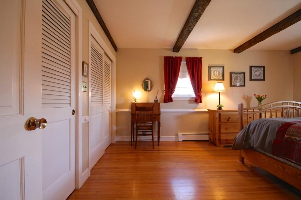 142 Louden Road Saco, ME 04072 - Photo 18 of 35 Master bedroom. Hardwood floors and...