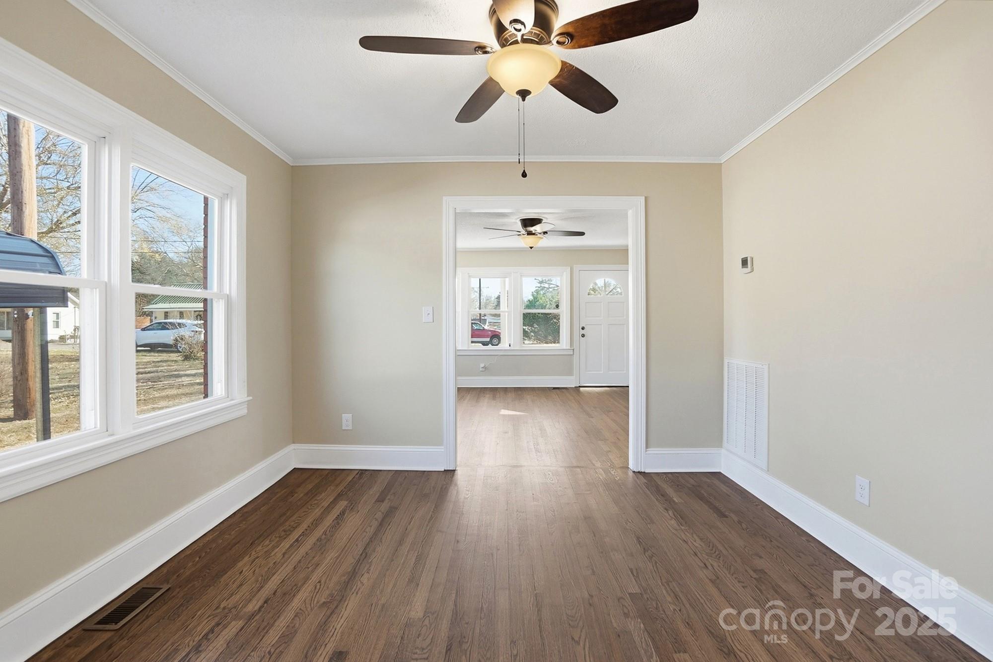 412 Ridge Street Stanley, NC 28164 - Photo 13 of 30 wooden floor in an empty room with a window