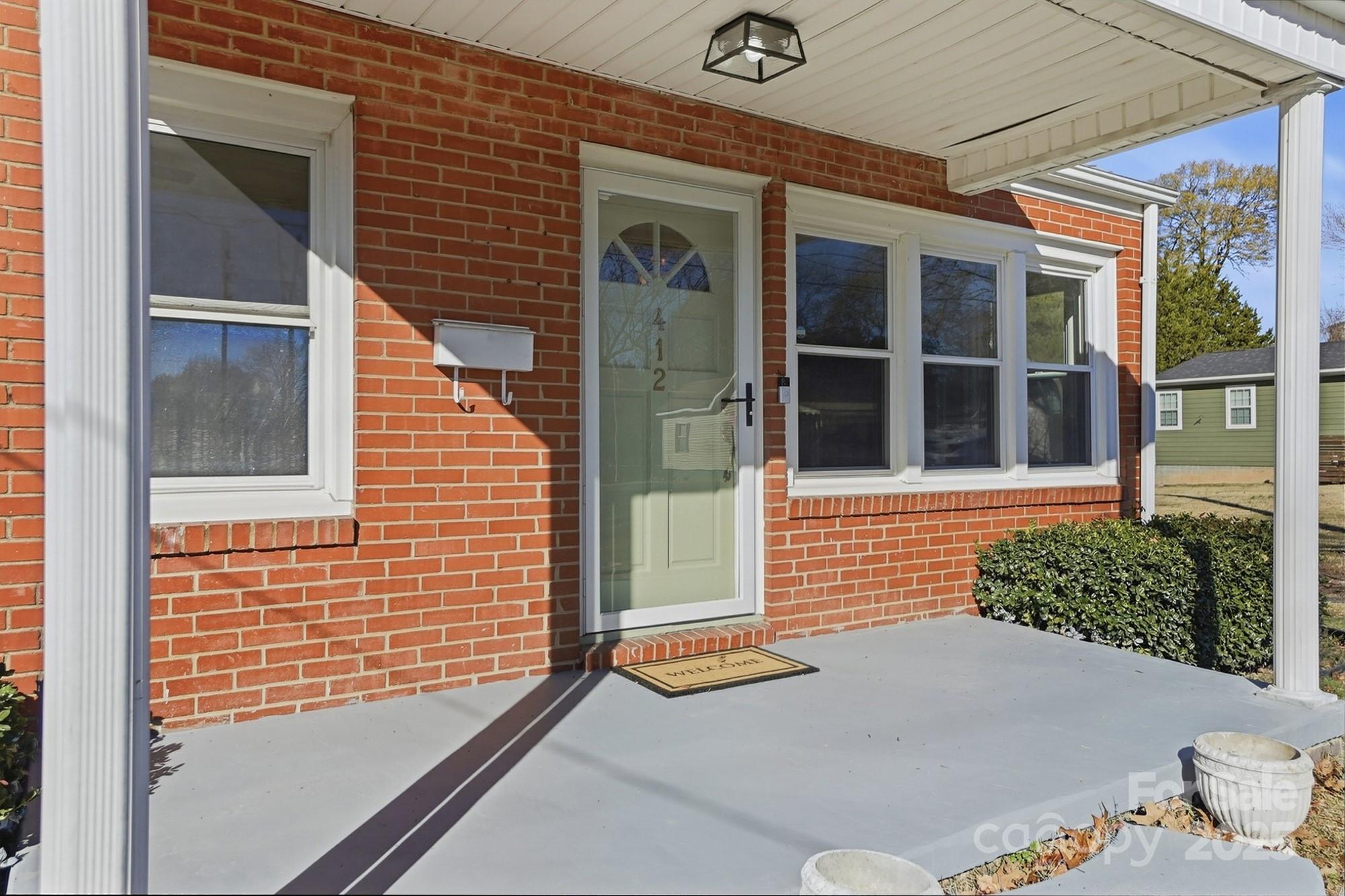 412 Ridge Street Stanley, NC 28164 - Photo 2 of 30 a view of entrance door of the house