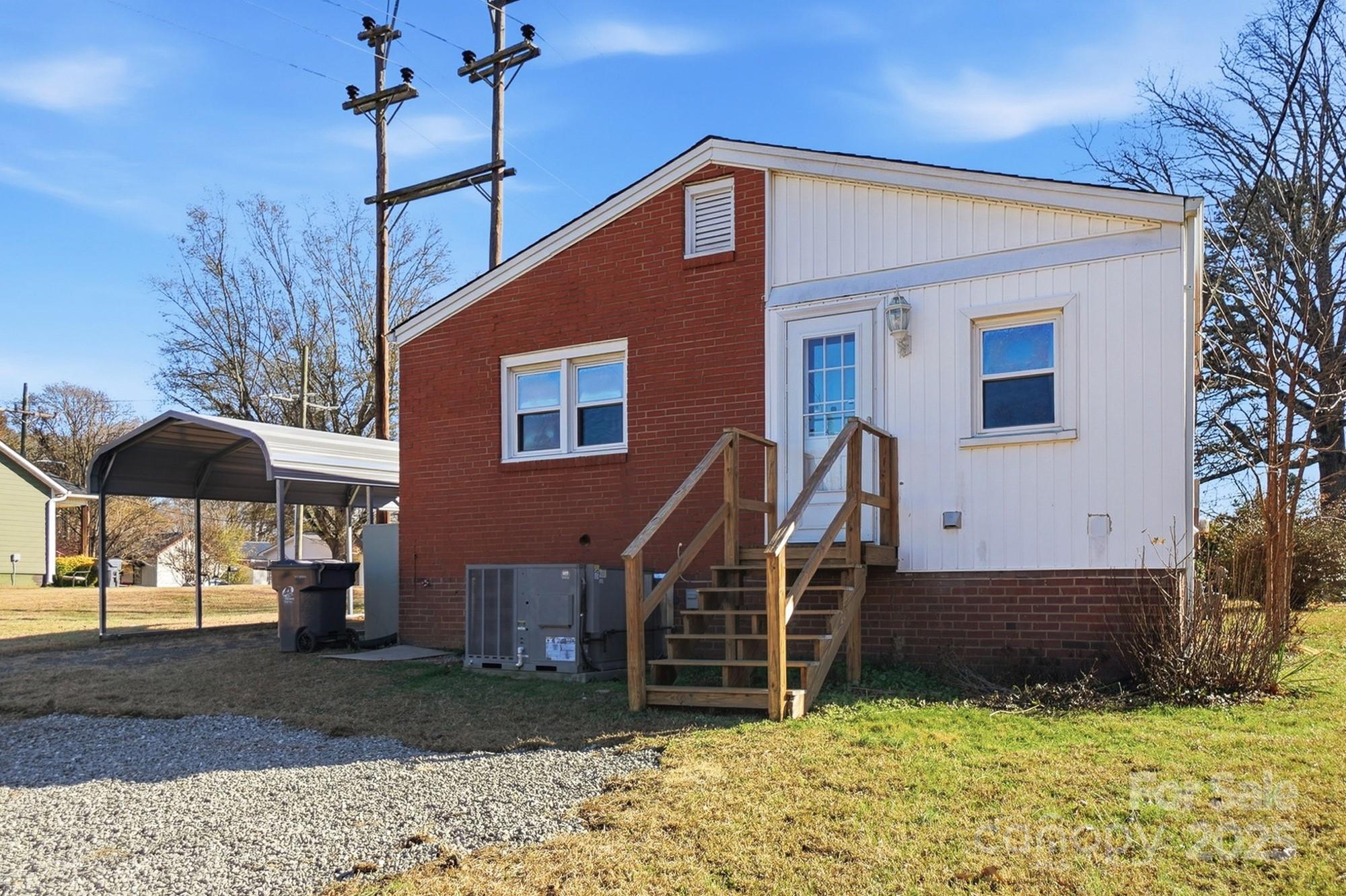 412 Ridge Street Stanley, NC 28164 - Photo 27 of 30 a front view of a house with a yard