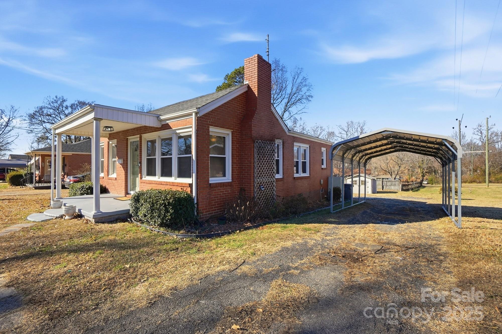 412 Ridge Street Stanley, NC 28164 - Photo 3 of 30 a view of house with yard
