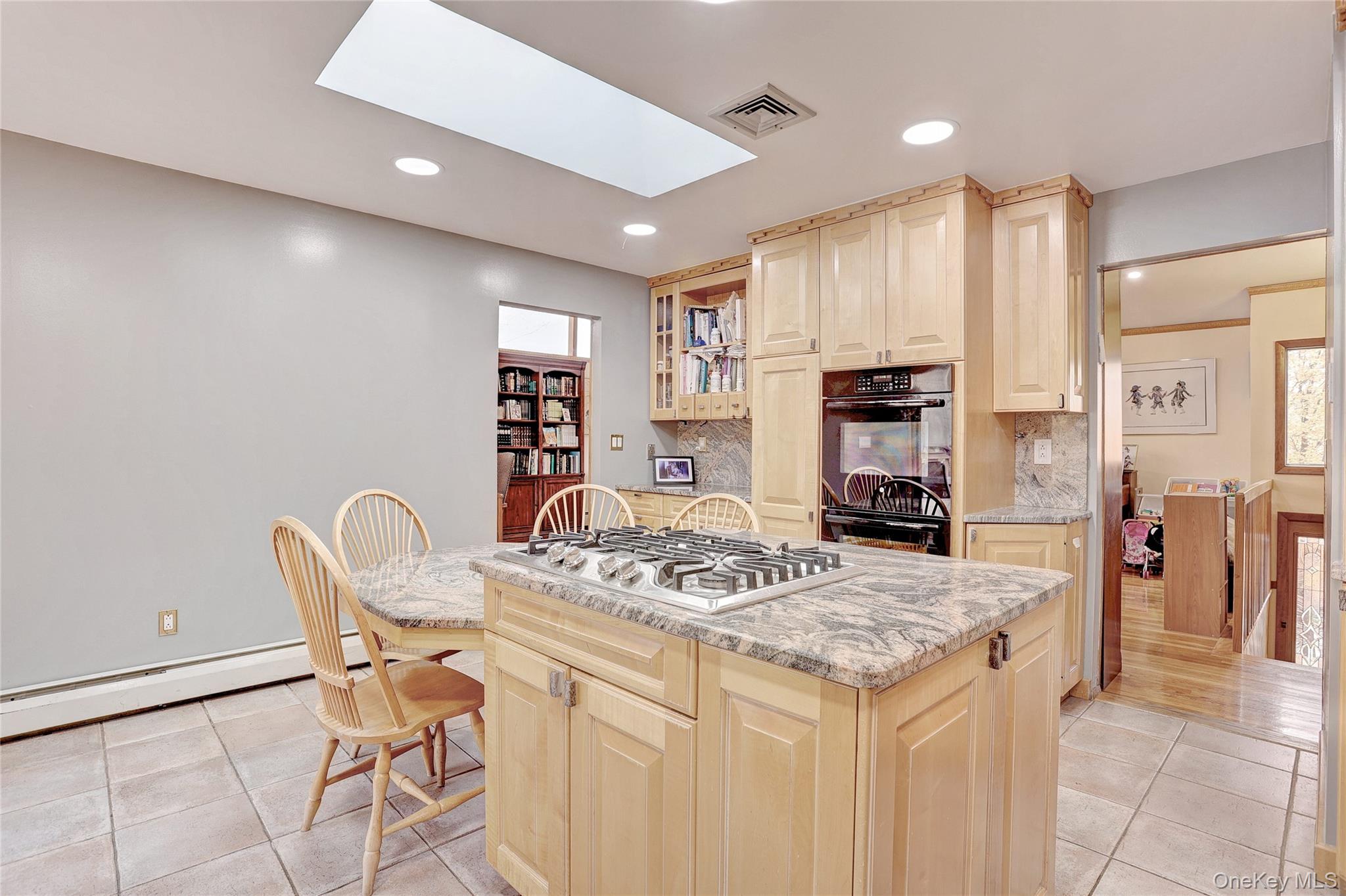 23 Sherwood Ridge Road Pomona, NY 10970 - Photo 13 of 28 a kitchen that has a table and chairs in it