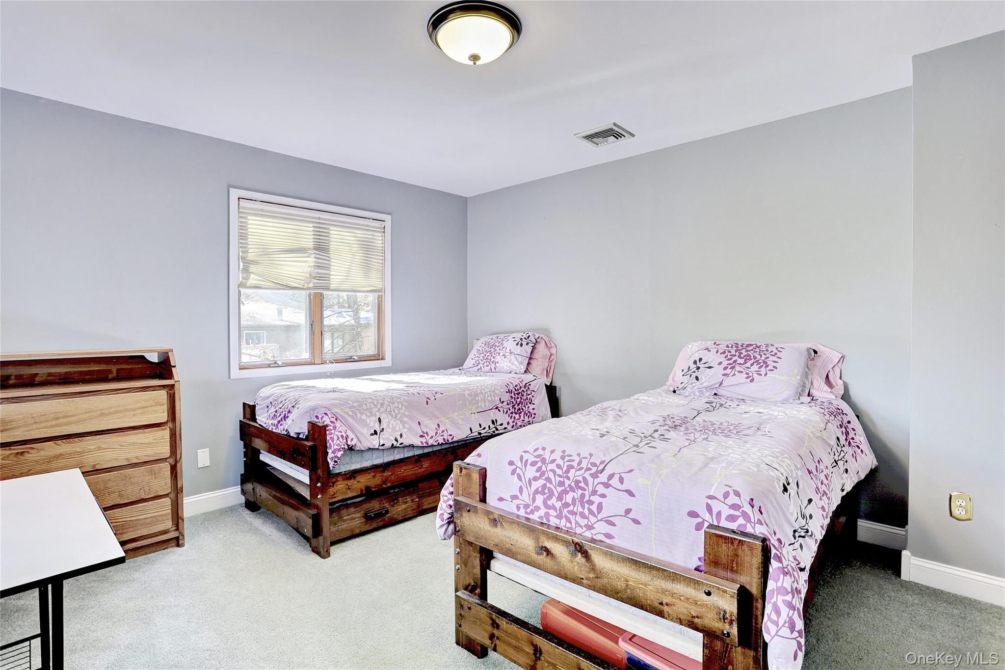 23 Sherwood Ridge Road Pomona, NY 10970 - Photo 16 of 28 a bedroom with two beds and a dresser