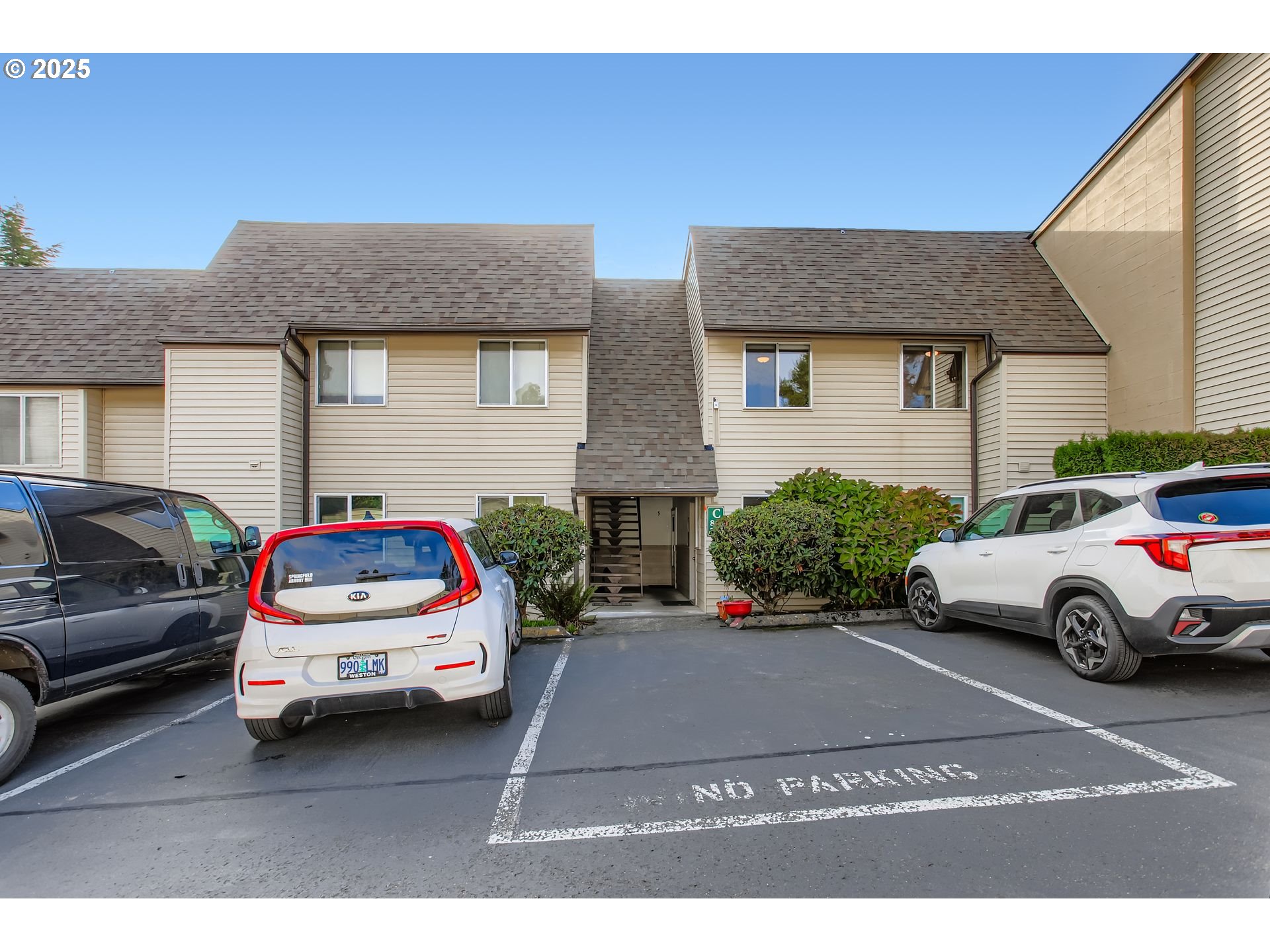200 Southwest Florence Avenue, Unit C6 Gresham, OR 97080 - Photo 1 of 21 a view of cars parked in front of a house