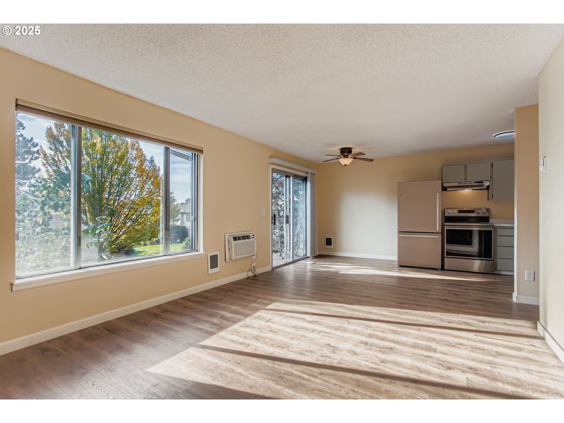 200 Southwest Florence Avenue, Unit C6 Gresham, OR 97080 - Photo 2 of 21 an empty room with windows and closet