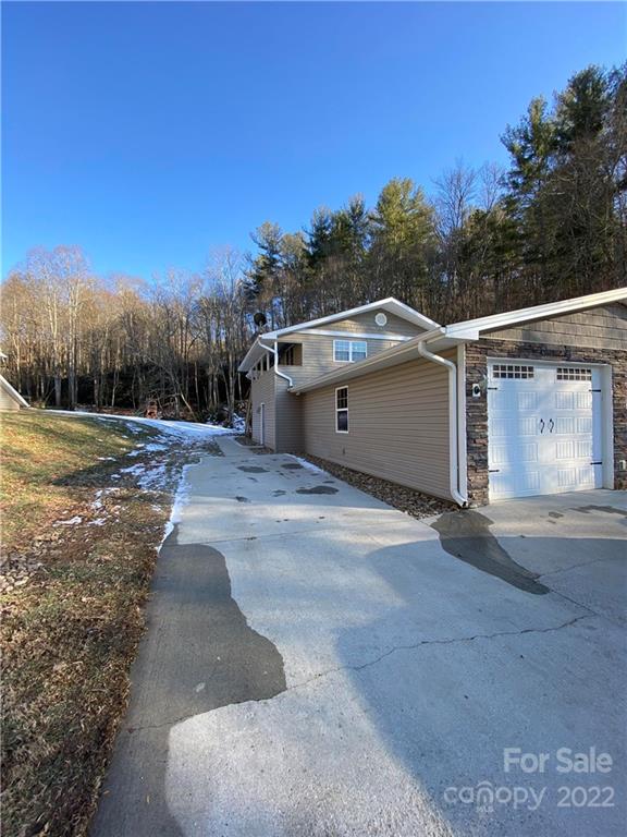 a view of a street with a building in the background