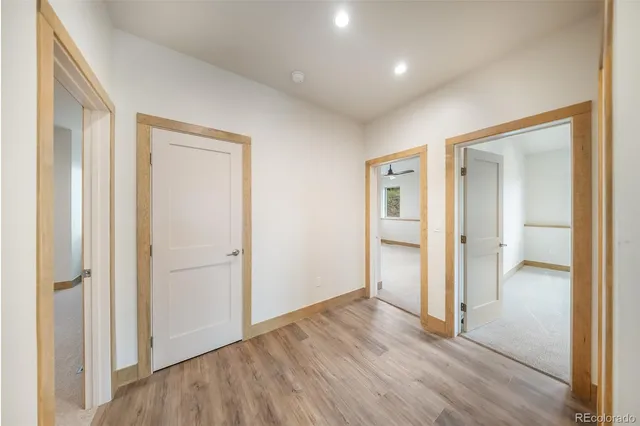 an empty room with closet area