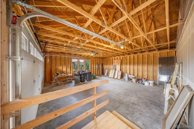 a house with wooden fence