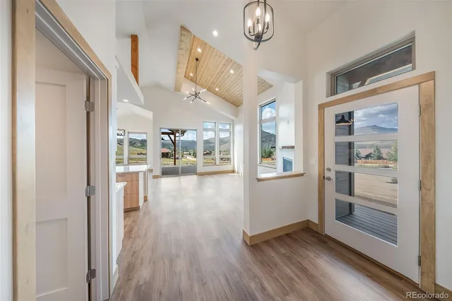 a view of livingroom with kitchen