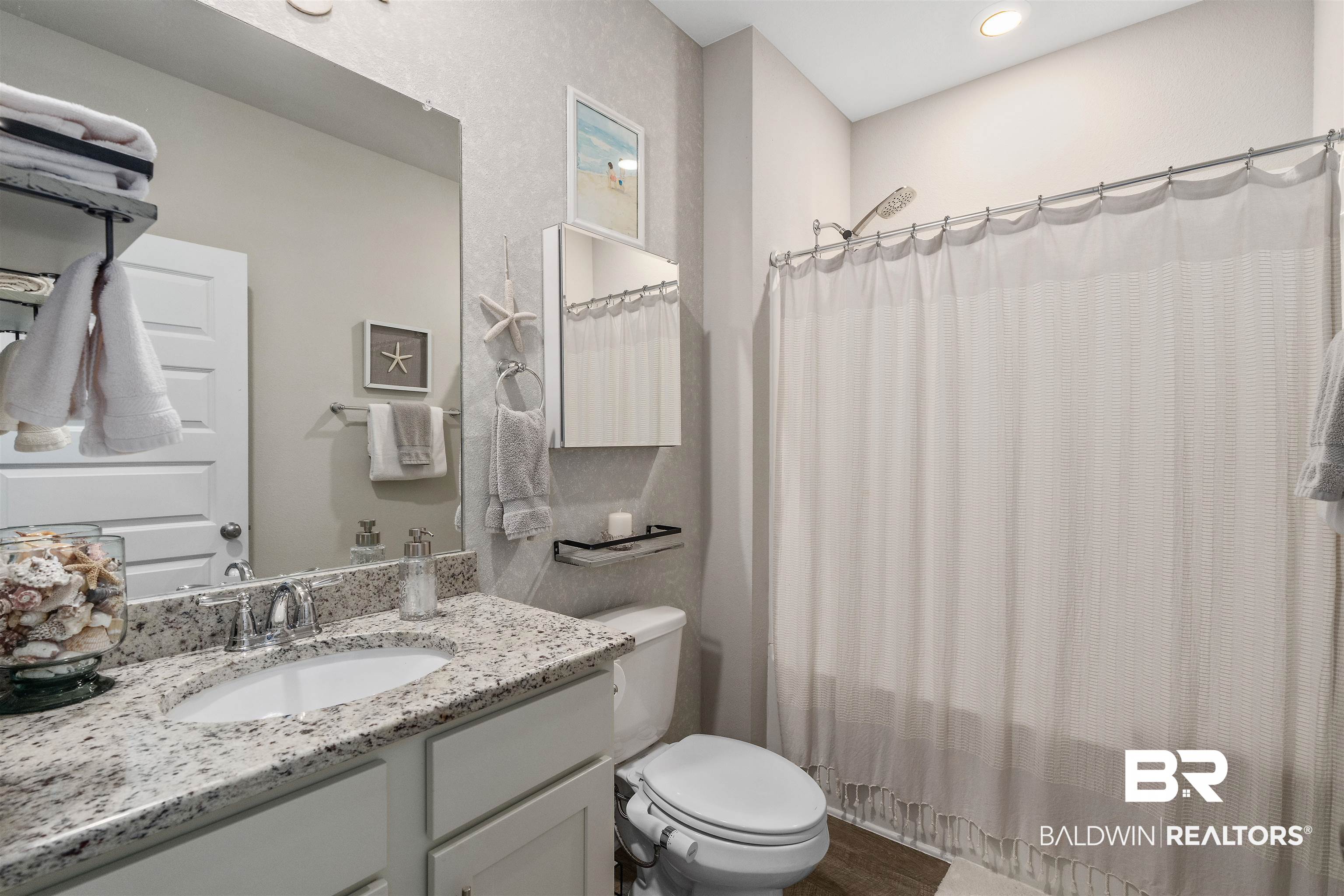 24593 Slater Mill Road Daphne, AL 36526 - Photo 21 of 32 Bathroom with vanity and wood finished floors