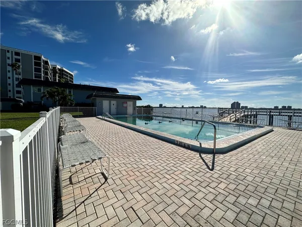 a view of a terrace with wooden fence