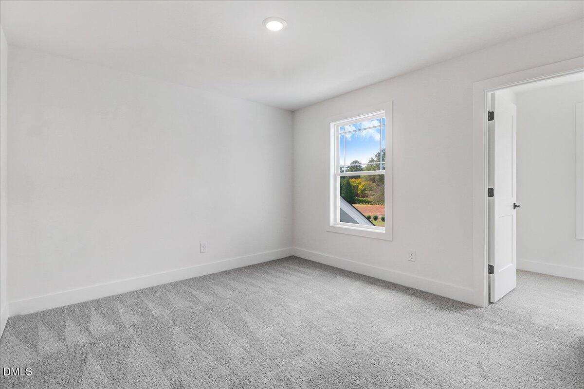 2 Galway Road Lillington, NC 27546 - Photo 25 of 37 an empty room with a window