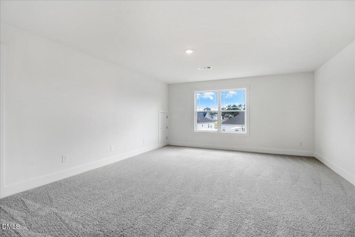 2 Galway Road Lillington, NC 27546 - Photo 29 of 37 an empty room with a window