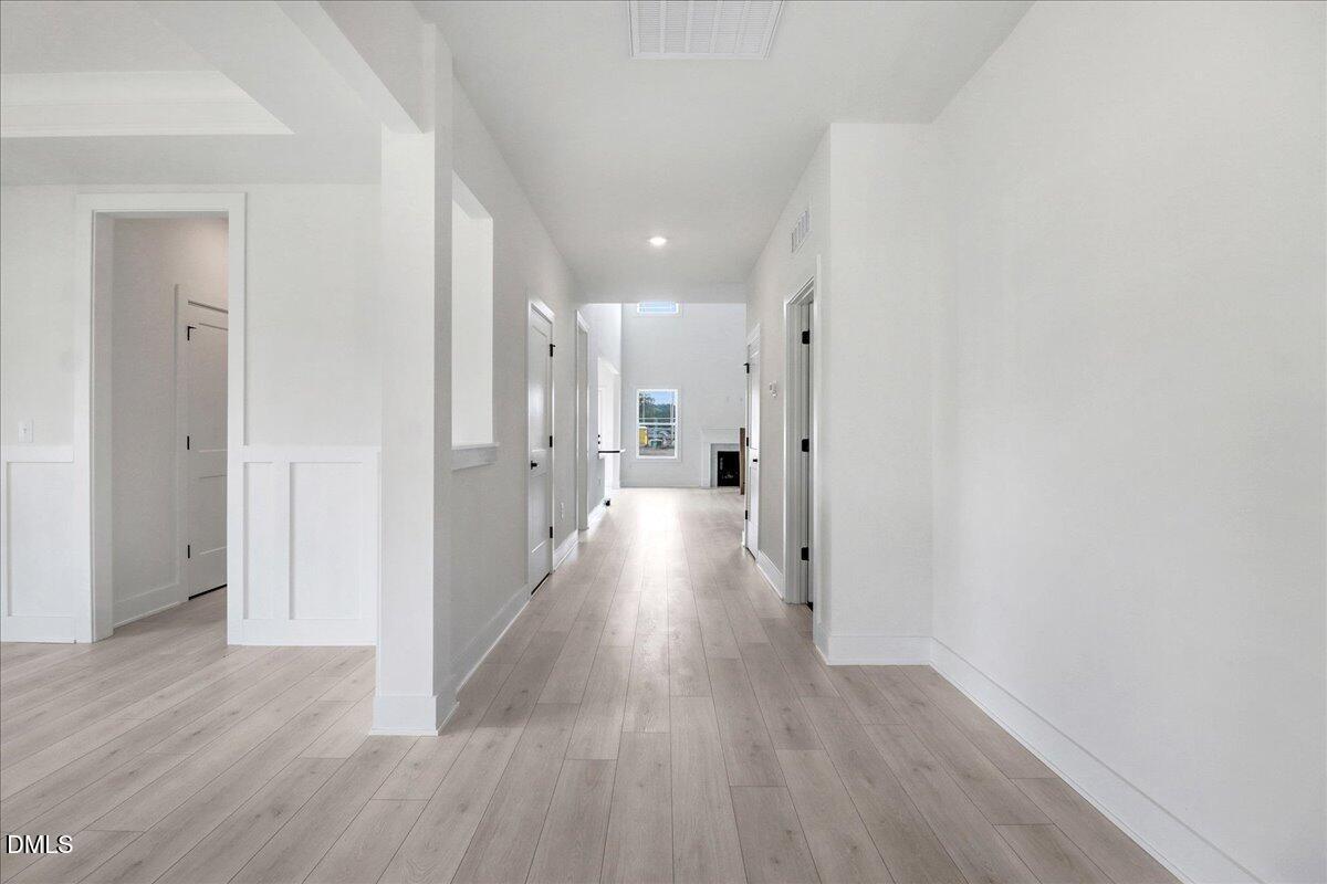 2 Galway Road Lillington, NC 27546 - Photo 2 of 37 a view of a hallway with wooden floor
