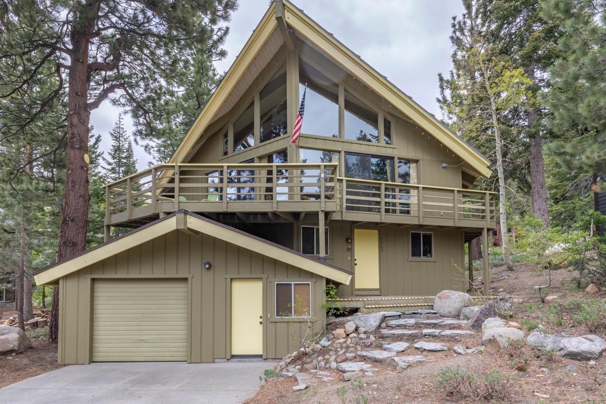 a front view of a house with a garage