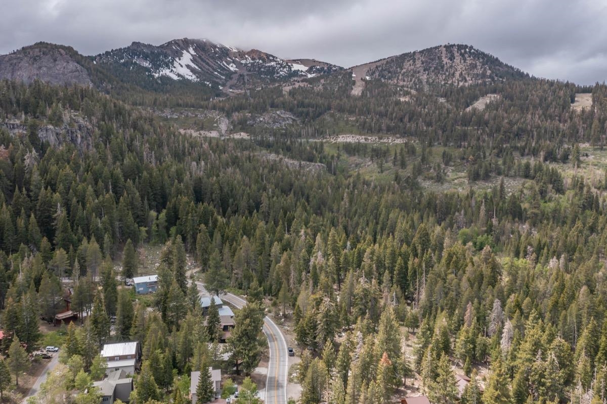 2563 Old Mammoth Road Mammoth Lakes, CA 93546 - Photo 2 of 49 a view of a dry yard with mountains in the background