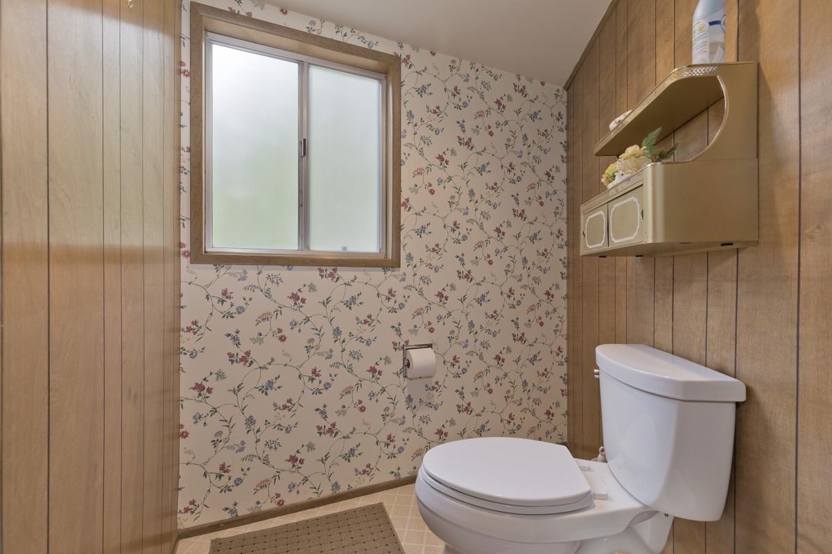 2563 Old Mammoth Road Mammoth Lakes, CA 93546 - Photo 23 of 49 a white toilet sitting next to a bathroom sink