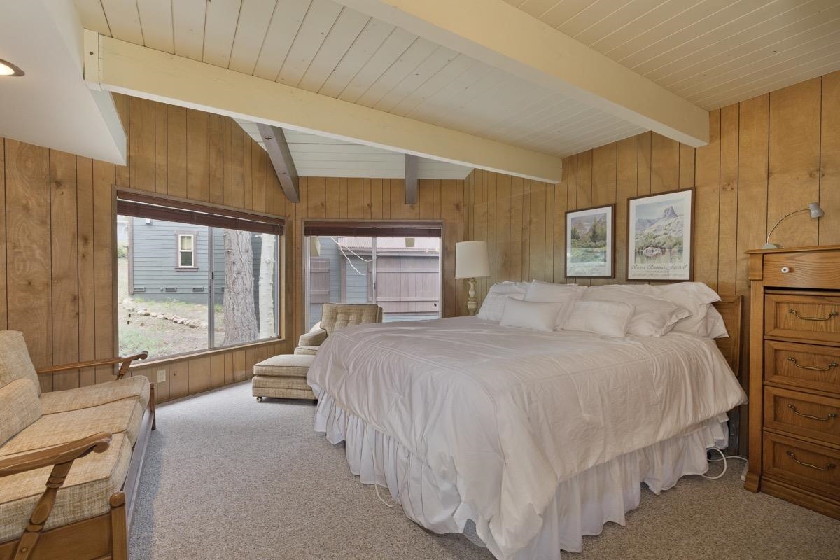 2563 Old Mammoth Road Mammoth Lakes, CA 93546 - Photo 29 of 49 a bedroom with a large bed and a large window