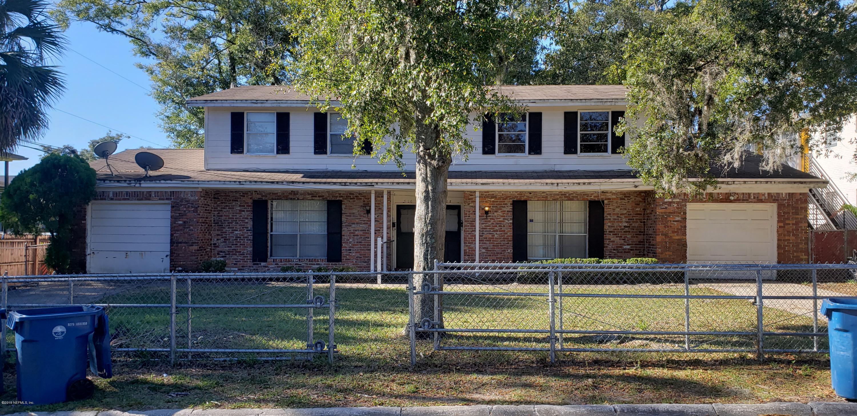 926 Bert Road Jacksonville, FL 32211 - Photo 1 of 7 a front view of a house with garden