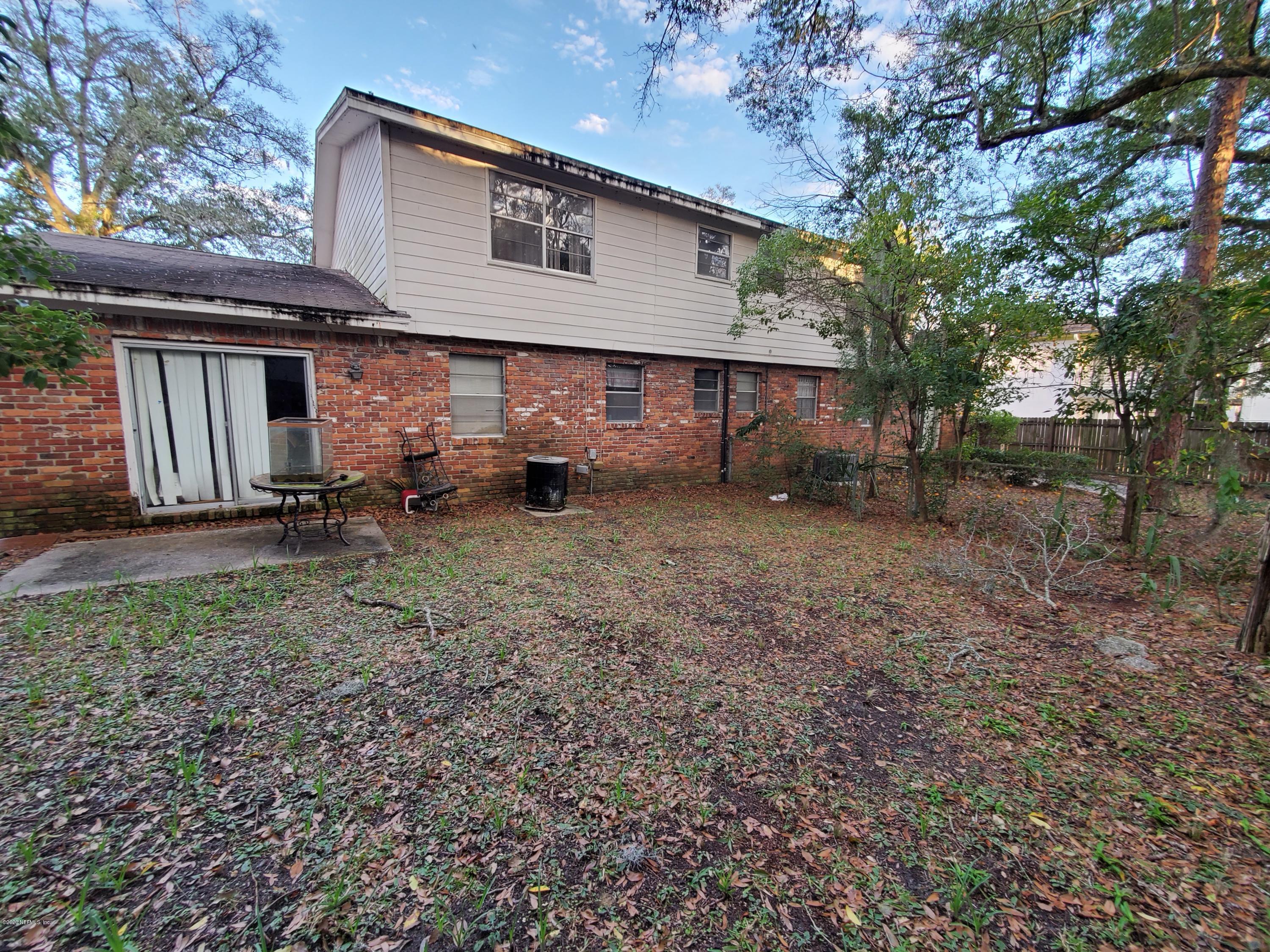 926 Bert Road Jacksonville, FL 32211 - Photo 3 of 7 a view of a house with backyard