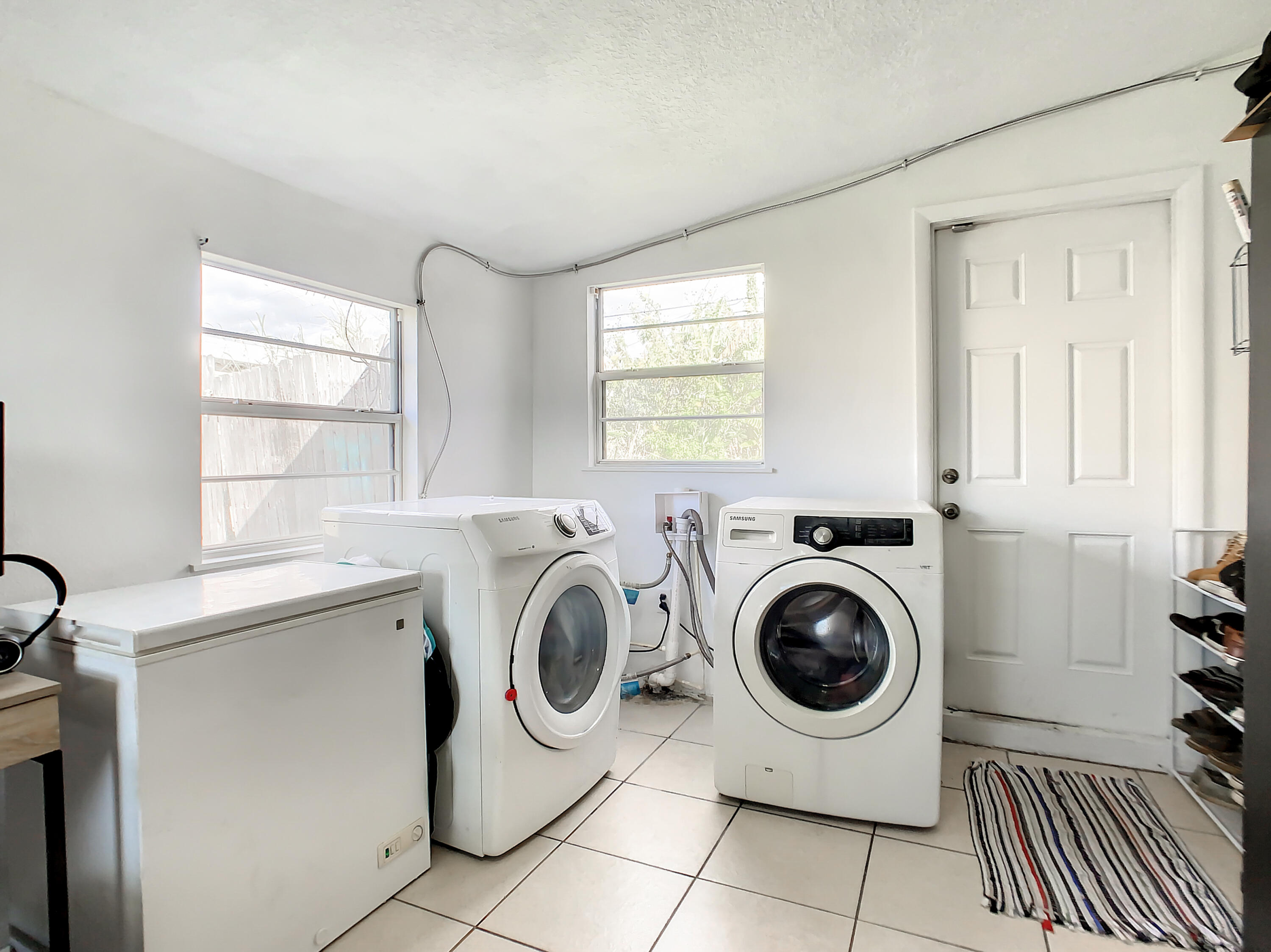 1956 Nottingham Road Melbourne, FL 32935 - Photo 22 of 32 a utility room with dryer and washer