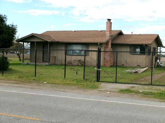 615 Rucker Avenue Gilroy, CA 95020 - Photo 2 of 12 a view of a house with a backyard