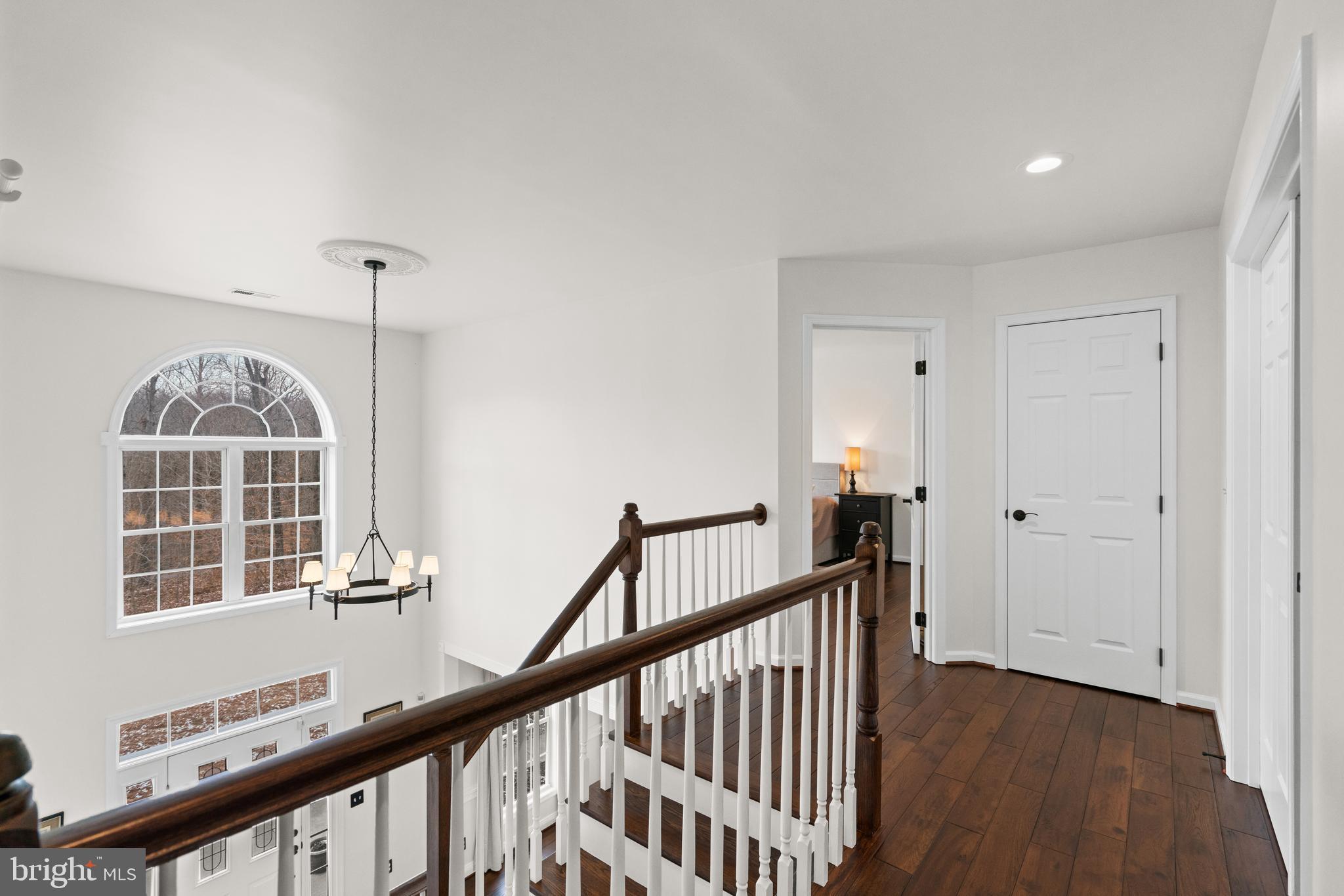 10448 Wheatley School Road Marshall, VA 20115 - Photo 21 of 40 a view of a hallway with windows