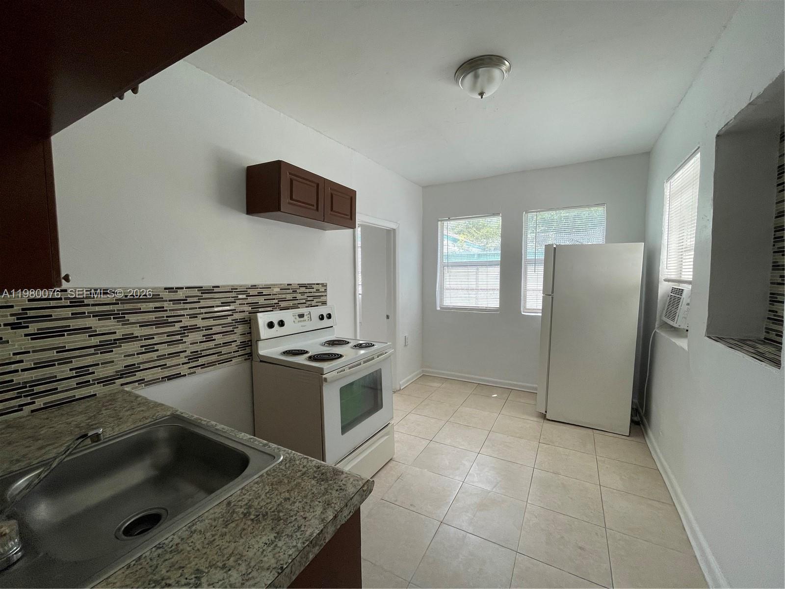 1060 Northwest 47th Street, Unit 4 Miami, FL 33127 - Photo 1 of 12