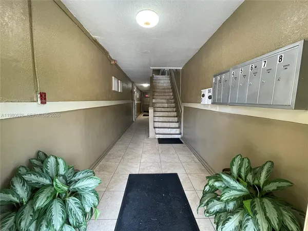 a view of entryway with stairs