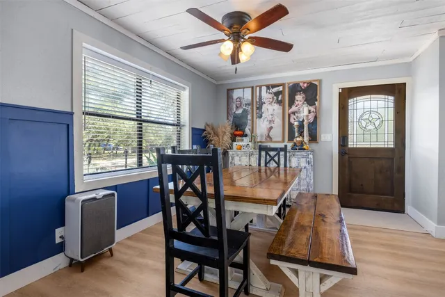 a kitchen with cabinets a sink and appliances