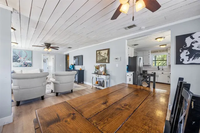 a reading room with furniture and a window