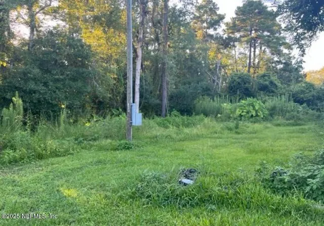 a view of outdoor space and green field