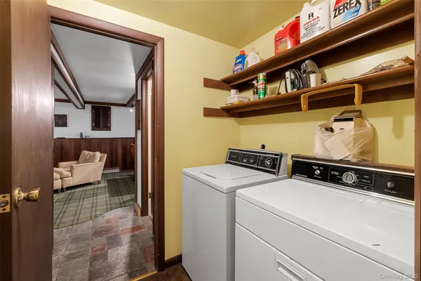 a utility room with dryer and washer
