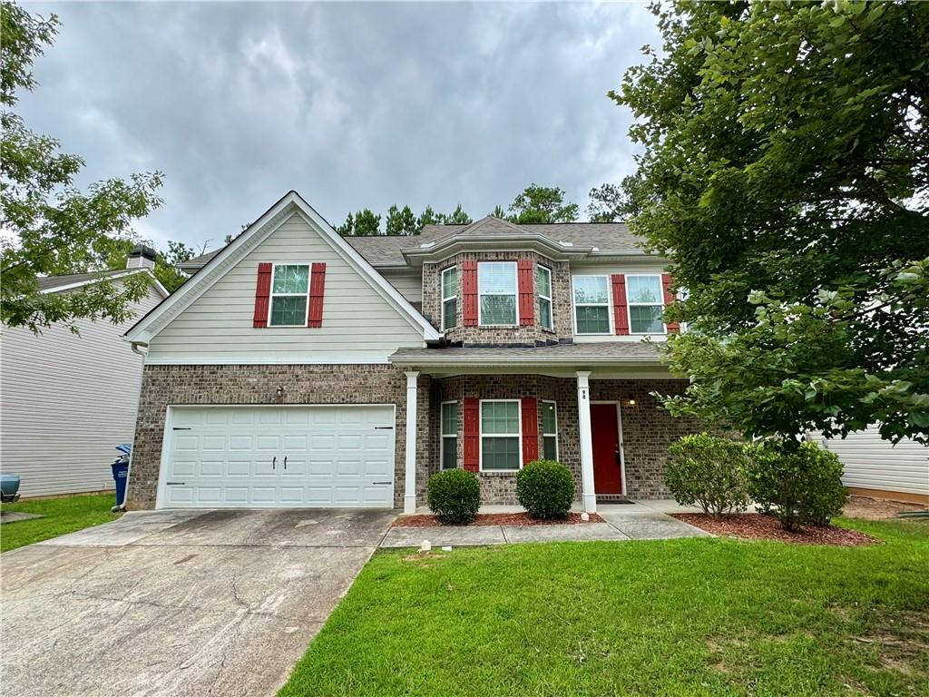98 Baywood Way Hiram, GA 30141 - Photo 2 of 55 front view of a house with a yard