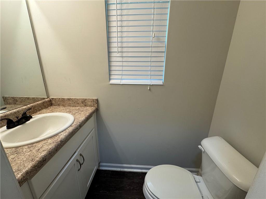 98 Baywood Way Hiram, GA 30141 - Photo 22 of 55 a bathroom with a granite countertop sink and a mirror