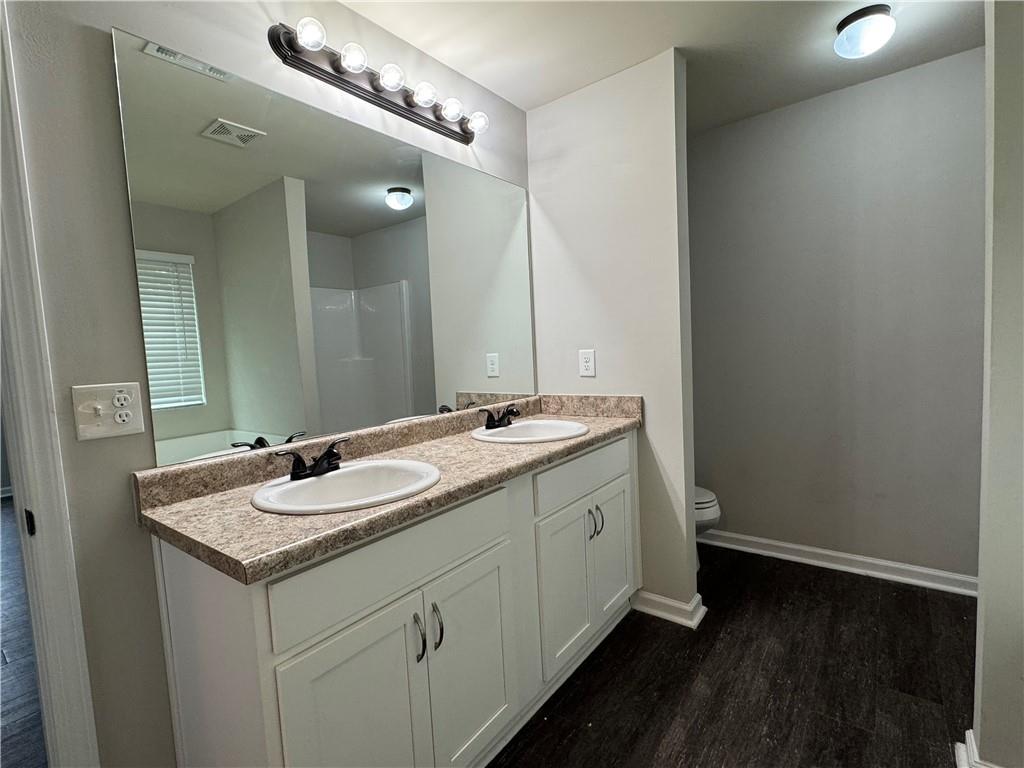 98 Baywood Way Hiram, GA 30141 - Photo 34 of 55 a bathroom with a sink and a mirror