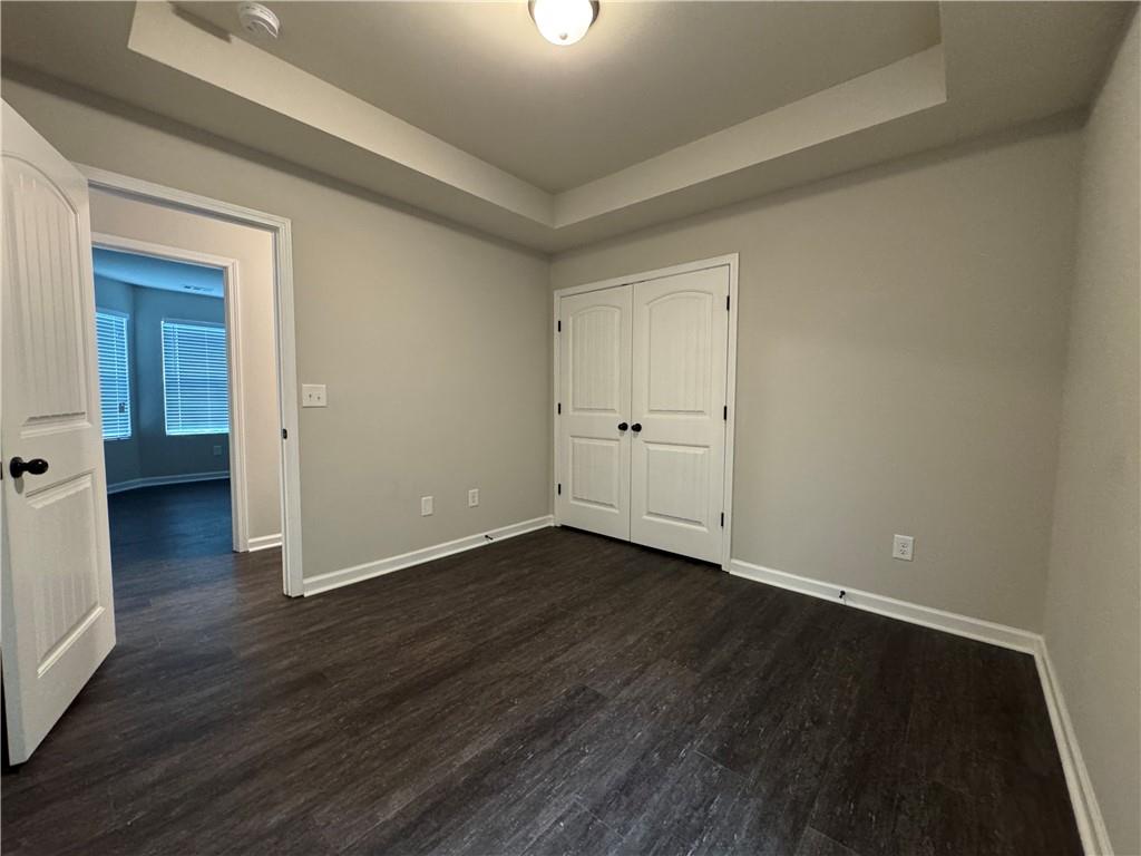 98 Baywood Way Hiram, GA 30141 - Photo 36 of 55 a view of an empty room with wooden floor