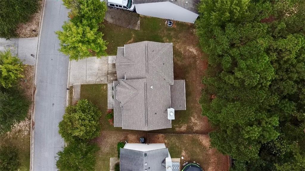 98 Baywood Way Hiram, GA 30141 - Photo 52 of 55 an aerial view of a house with outdoor space and trees all around