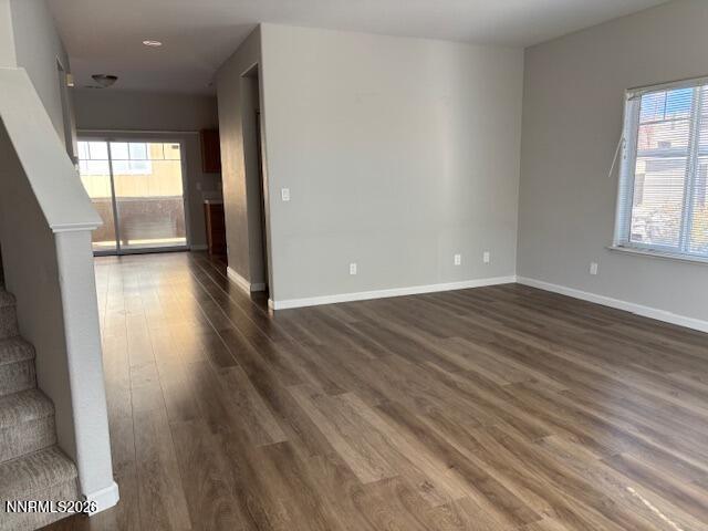 205 Dawson Jacob Ln. Reno, NV 89503 - Photo 5 of 33 an empty room with wooden floor and windows
