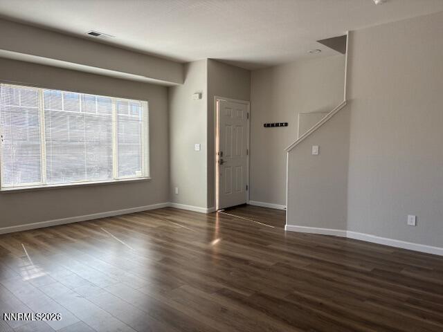 205 Dawson Jacob Ln. Reno, NV 89503 - Photo 10 of 33 an empty room with wooden floor and windows