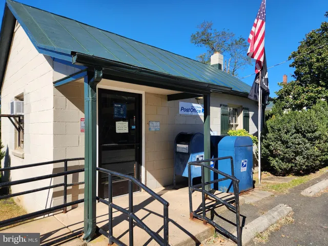 a view of a lake with a house